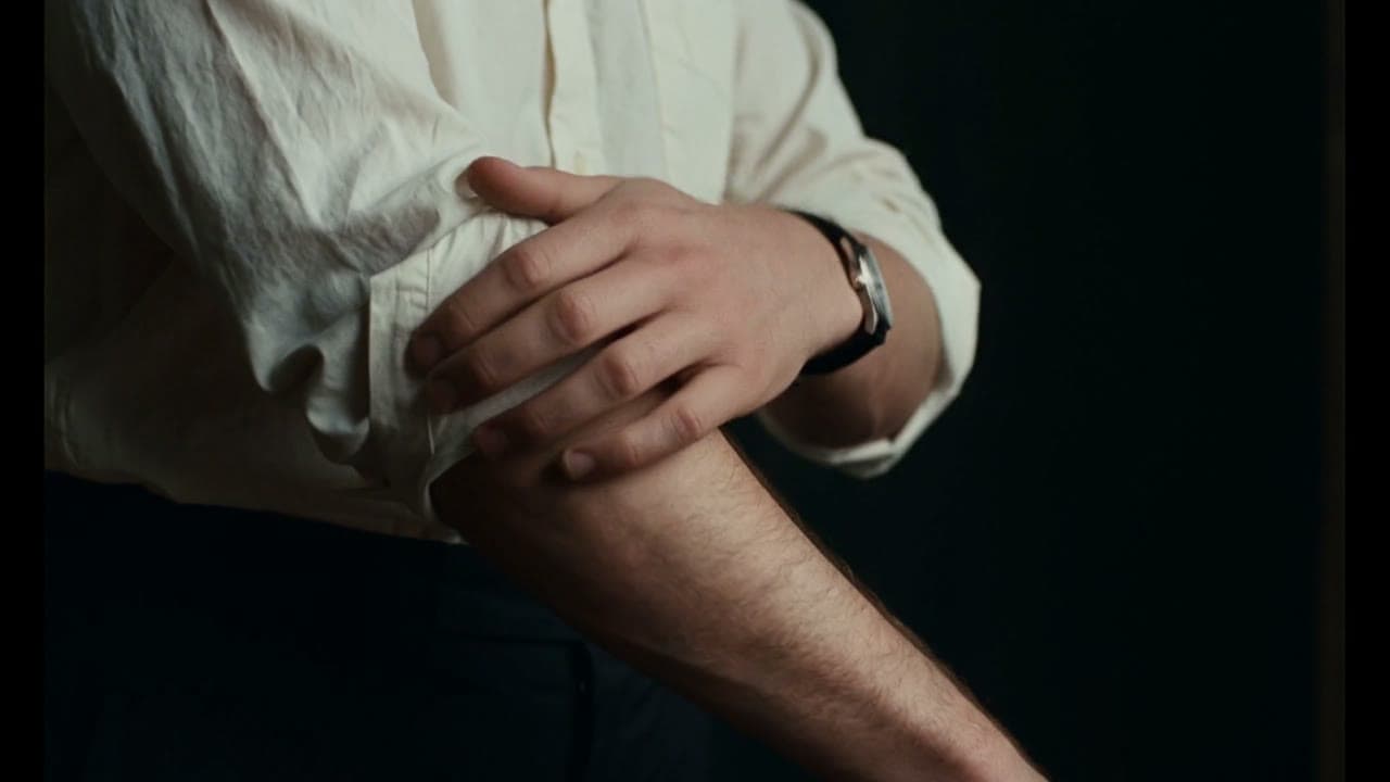 A sleeve being rolled up before the work.